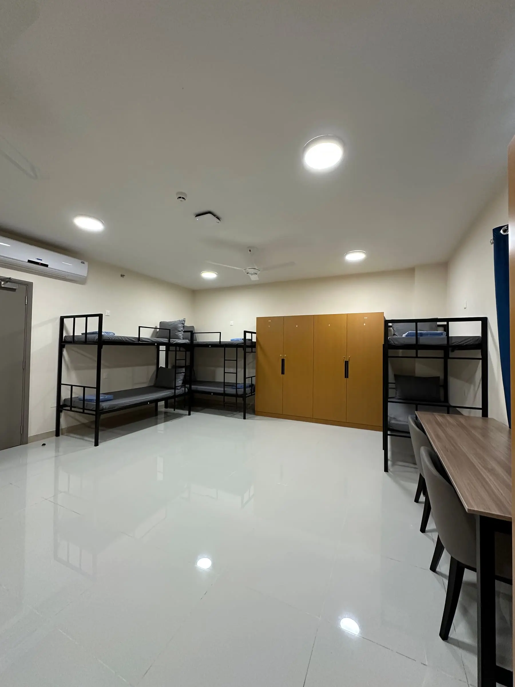 Basic room with bunk beds and wardrobes