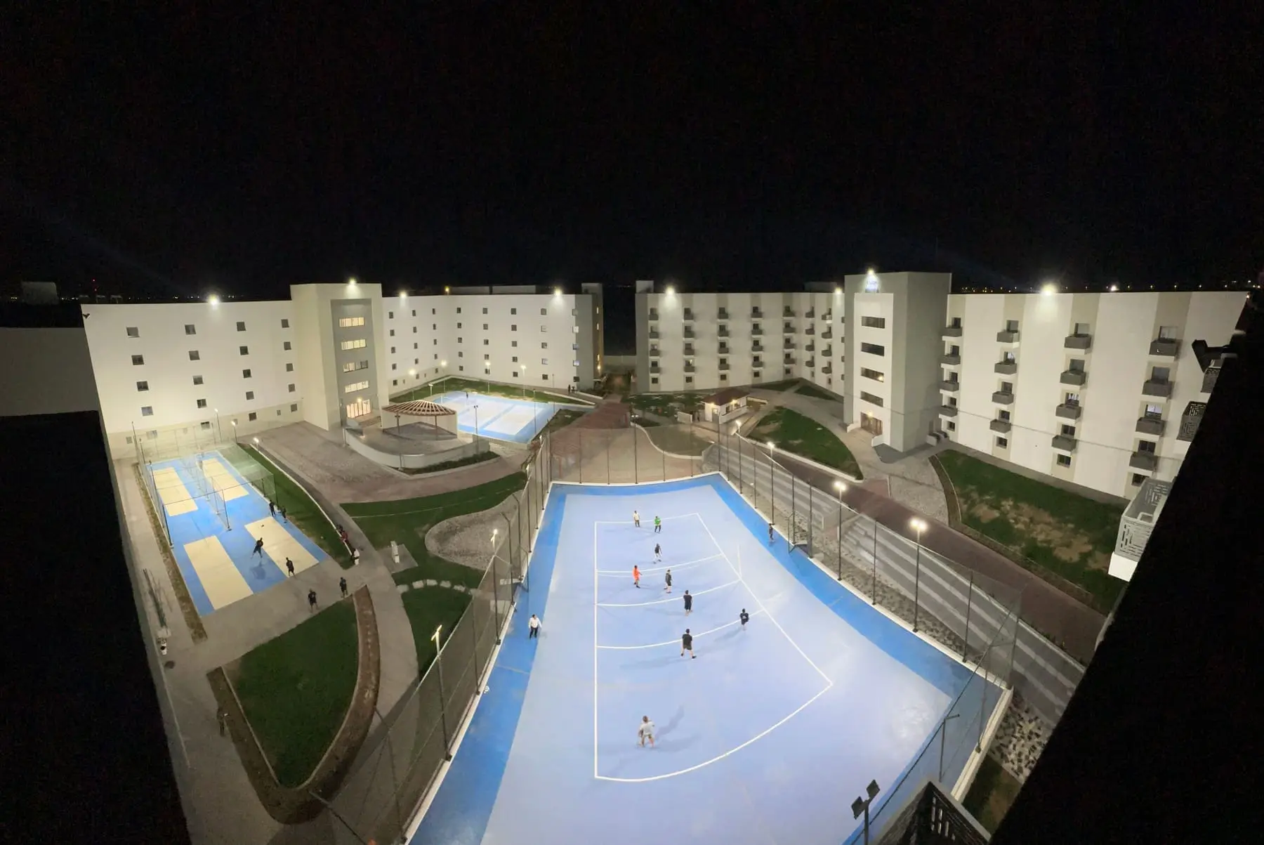 Sports courts in the courtyard at night